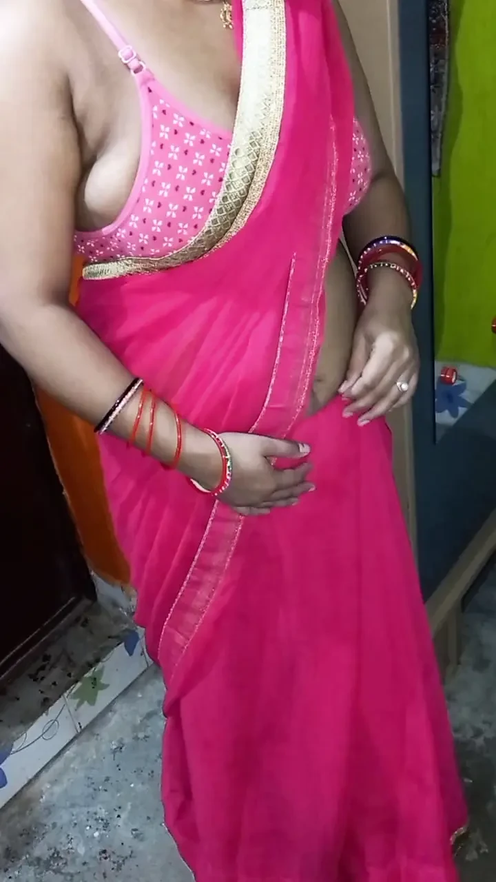 Indian Beautiful Bhabhi in Red Saari Having Sex.
