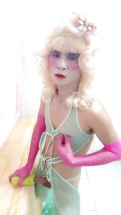 Oanh Le transgender wearing sexy clothes porn playing with an artificial can
