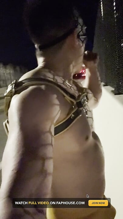 Midnight Muscle Tease: Asian Hunk Flexes Ass & Biceps in Yellow Harness on Highway Bridge