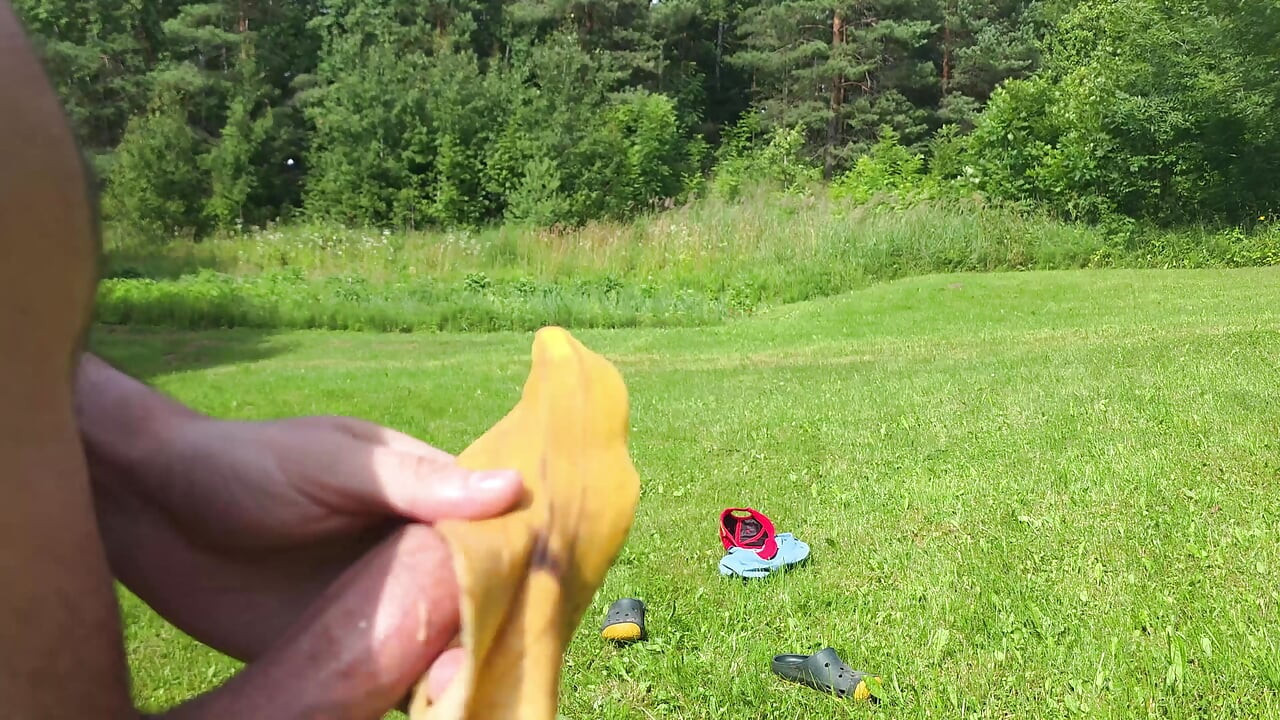 Cumming outdoors with a help of banana peel