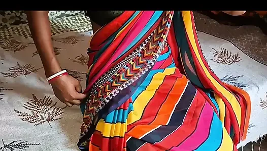 Auntie, clad in a red saree, approaches creating a beautiful and romantic moment filled with love anal sex