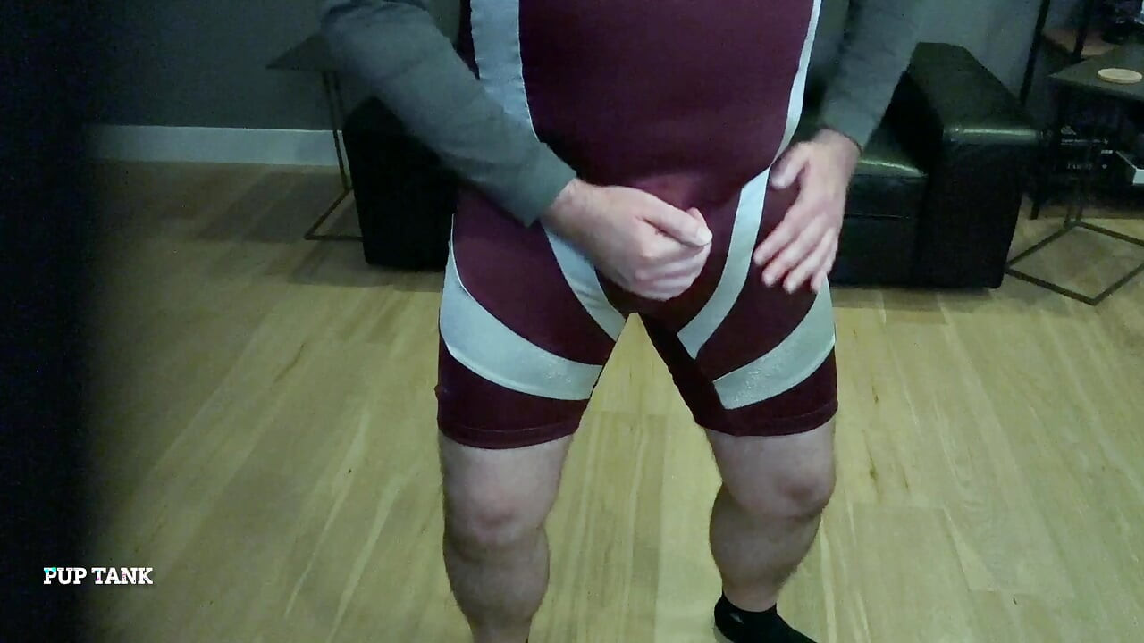 Muscle pup flexes in singlet and jerks off