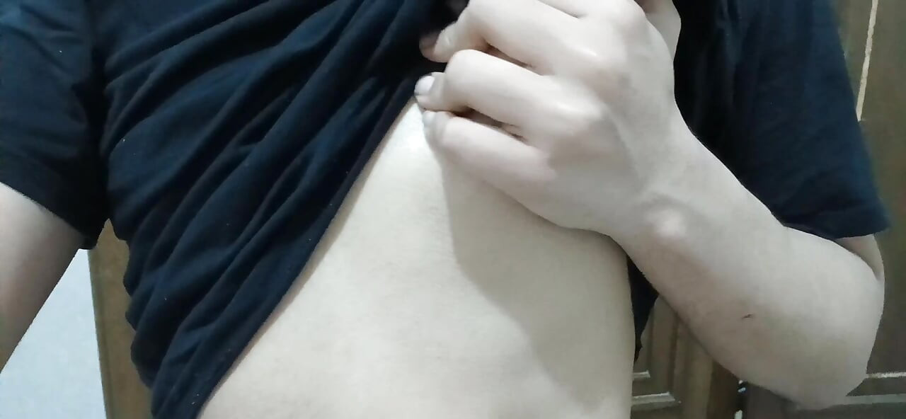 Hot Femboy playing with his boobs