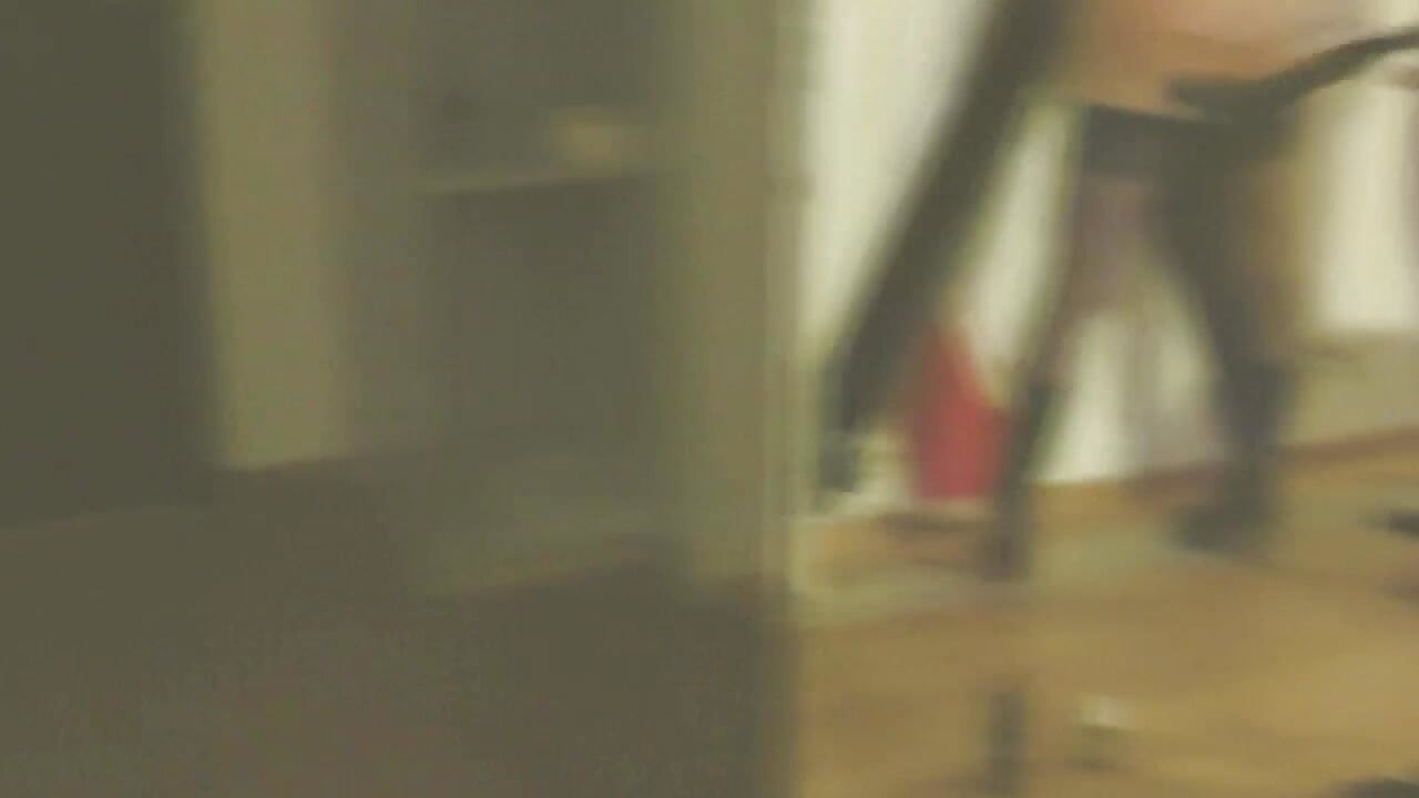 Swemature tied at St Andrew's cross at the hotel. Stay ups and porno boots, whipped and rewarded with cum in the mouth.