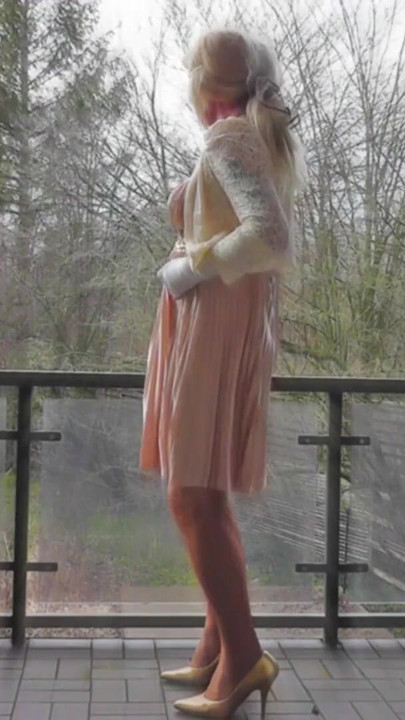 Memorable moment from "Wanking On A Winday Day In My Shiny Pleated Satin Gown"
