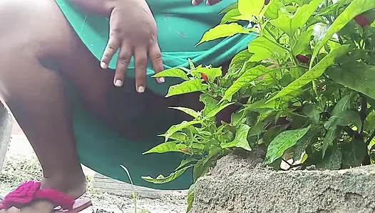 Hot BBW of hairy pussy pissing behind the bush