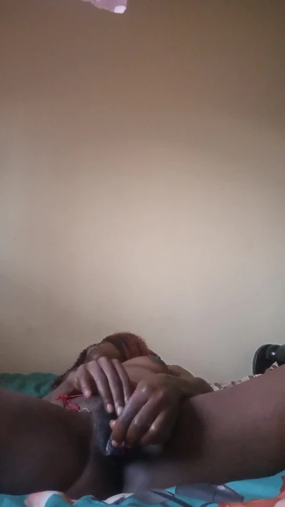 Key moment from "Candy27 fucking her self with sex toy while wearing waite waisted bead."