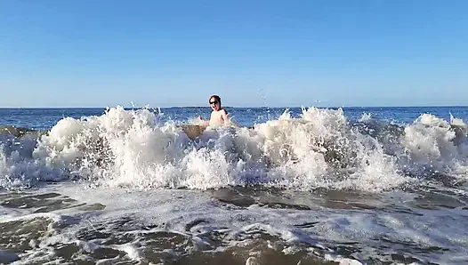 Real nudist Playing Naked in the Ocean Waves