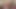 Tanned college blondie Millie fingers her horny little twat!