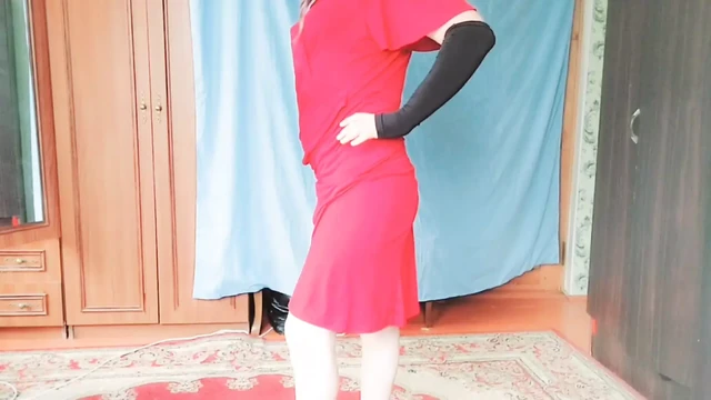 Stunning trans beauty enjoying warm sunlight by balcony