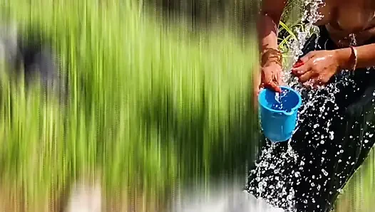 The desi stepsister of the village is bathing openly in the open field, bathing naked in the forest, brother-in-law is secretly
