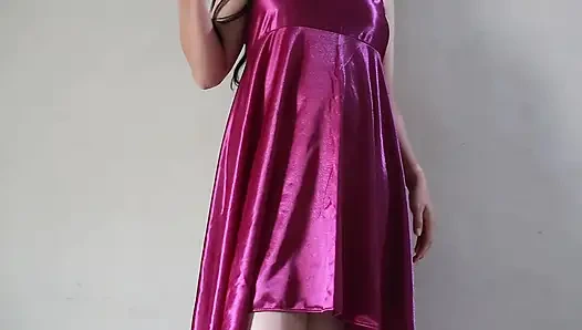 A GIRL WHO WEARS A SEXY SATIN DRESS IN THE LATEST INDO