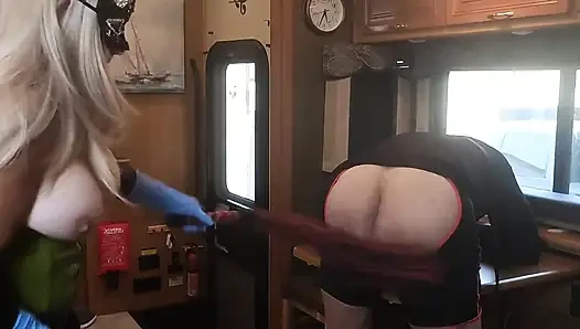 Domme Blondie Fucks His Ass in the Motorhome so All Can See