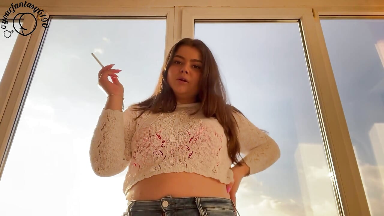 Latina Smoking at Sunset
