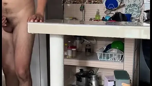 Stepmom masturbates in the kitchen with her huge tits