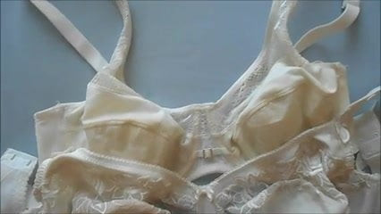 Big cumshot in two white bras .
