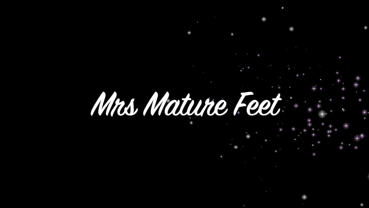 Mrs Mature Feet gives her lover a BJ