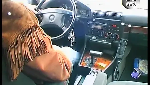 Blonde girl lets her boyfriend finger her in the car