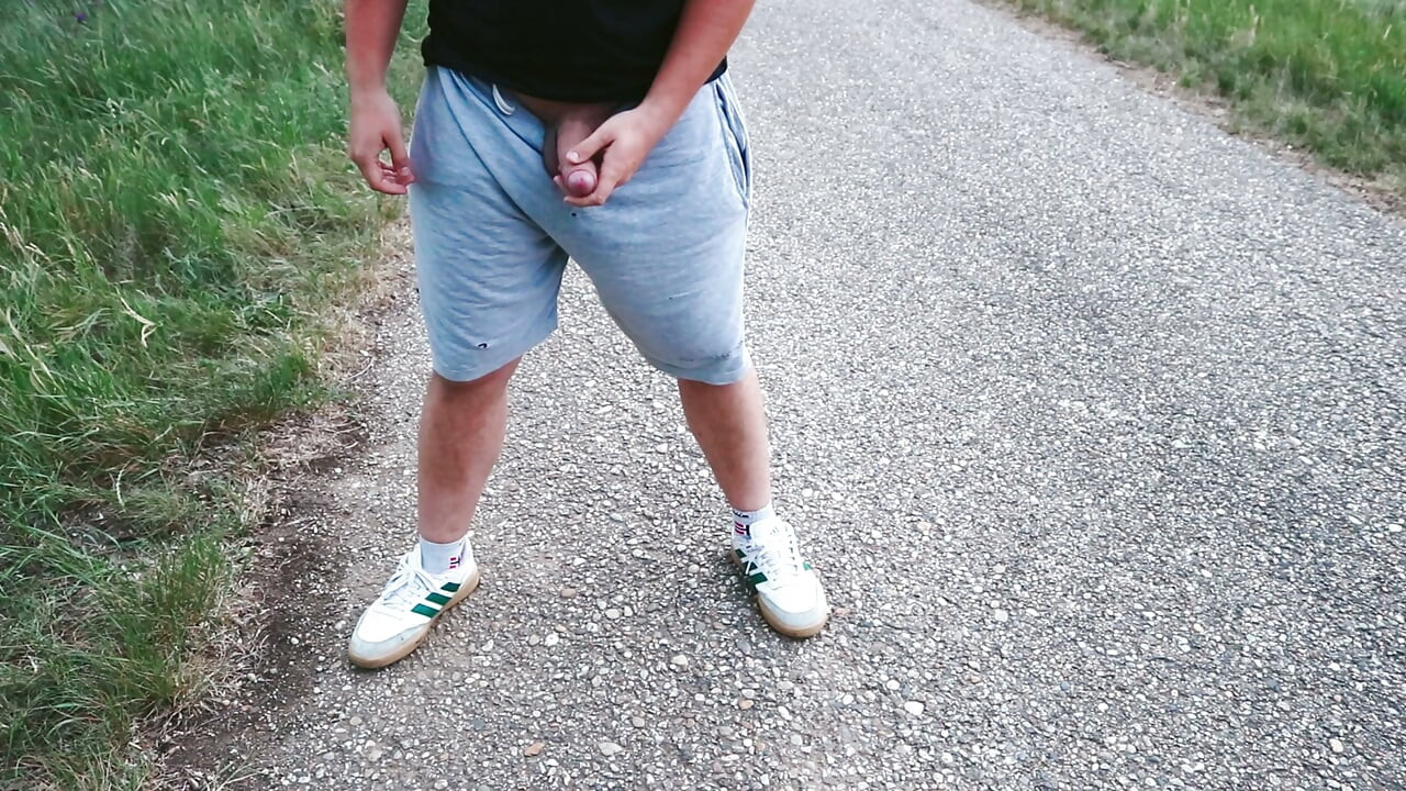 Pissing with a bare cock in nature