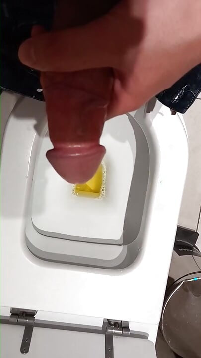 A cumm with a big cock in the work bathroom.