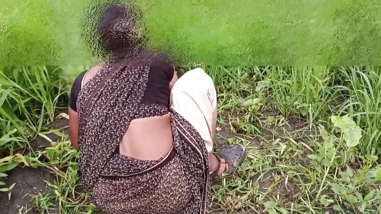The desi daughter-in-law of the village is taking off her clothes in the millet field and showing her finger in her pussy to her father-in-law.