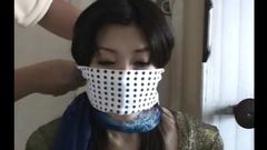 Chihiro Koganezaki Japanse fetisjkoningin mond gesnoerd en vastgebonden 1