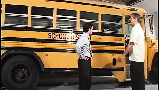 Blond student in pigtails gets fucked by two dudes in the school bus garage