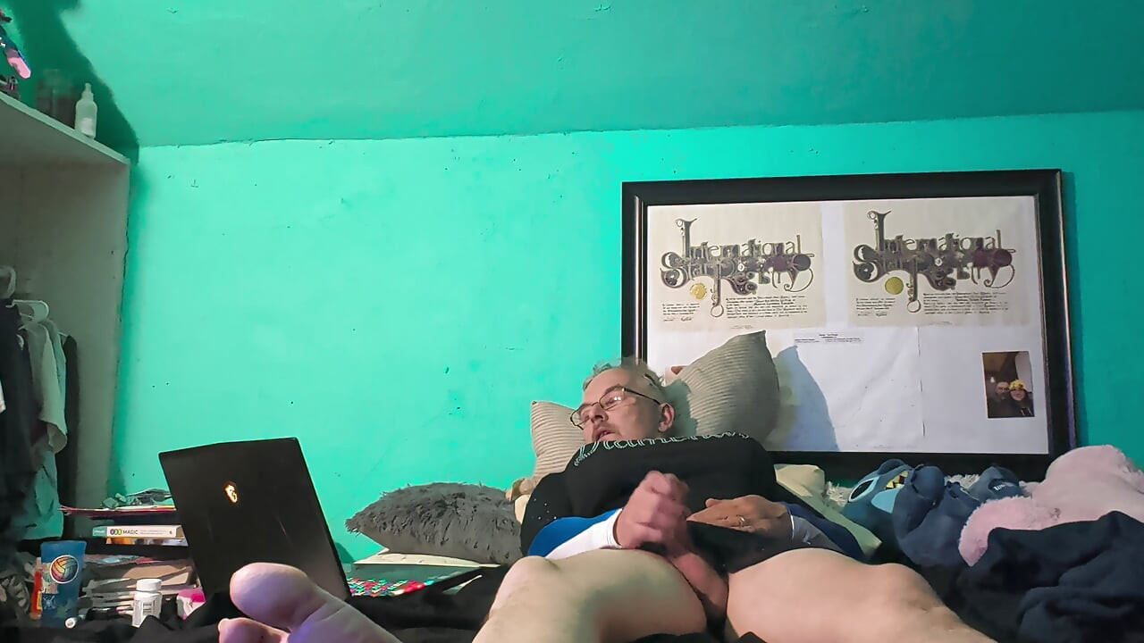 Masturbating in wife's cheerleading uniform.