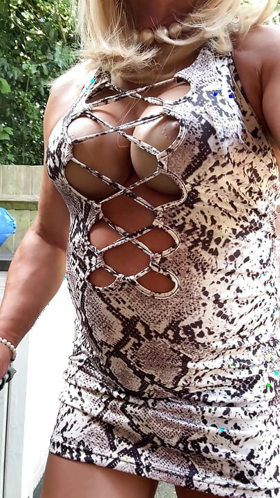 Sexy Crossdresser kellycd2022 in white animal print dress pantyhose and heels