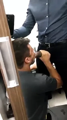 He sucks a suited gay