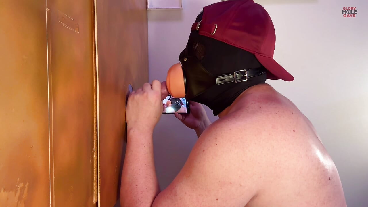Young straight guy with a big cock at the gloryhole