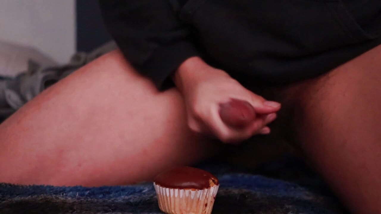 covering a cupcake with cum