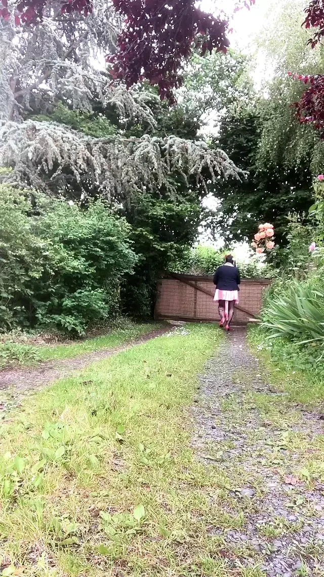 In a schoolgirl outfit with a little pink skirt for a night out