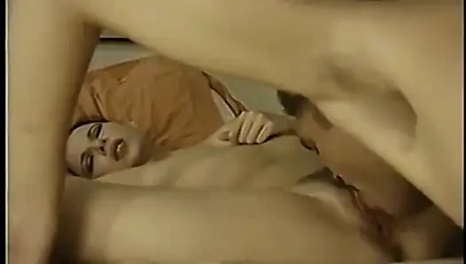 Guy sucks on a big cock and brunette sucks on his cock