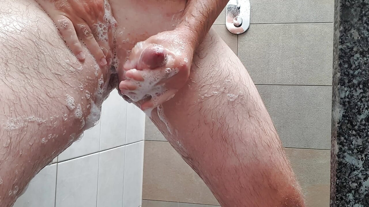 Horny cock shaved in the shower and cumshot