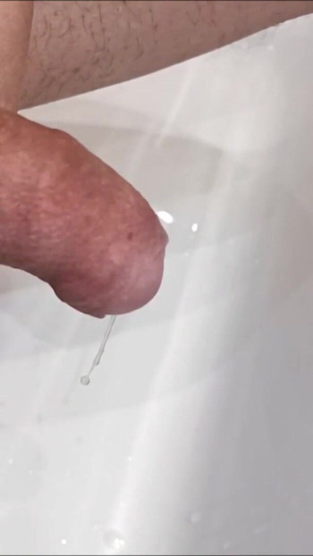 Must-share moment from "Slow motion flooding cumshot, cumming with a ball stretcher"
