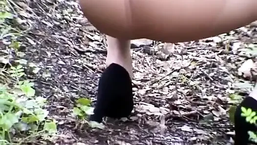 Kitten in outdoor pissing