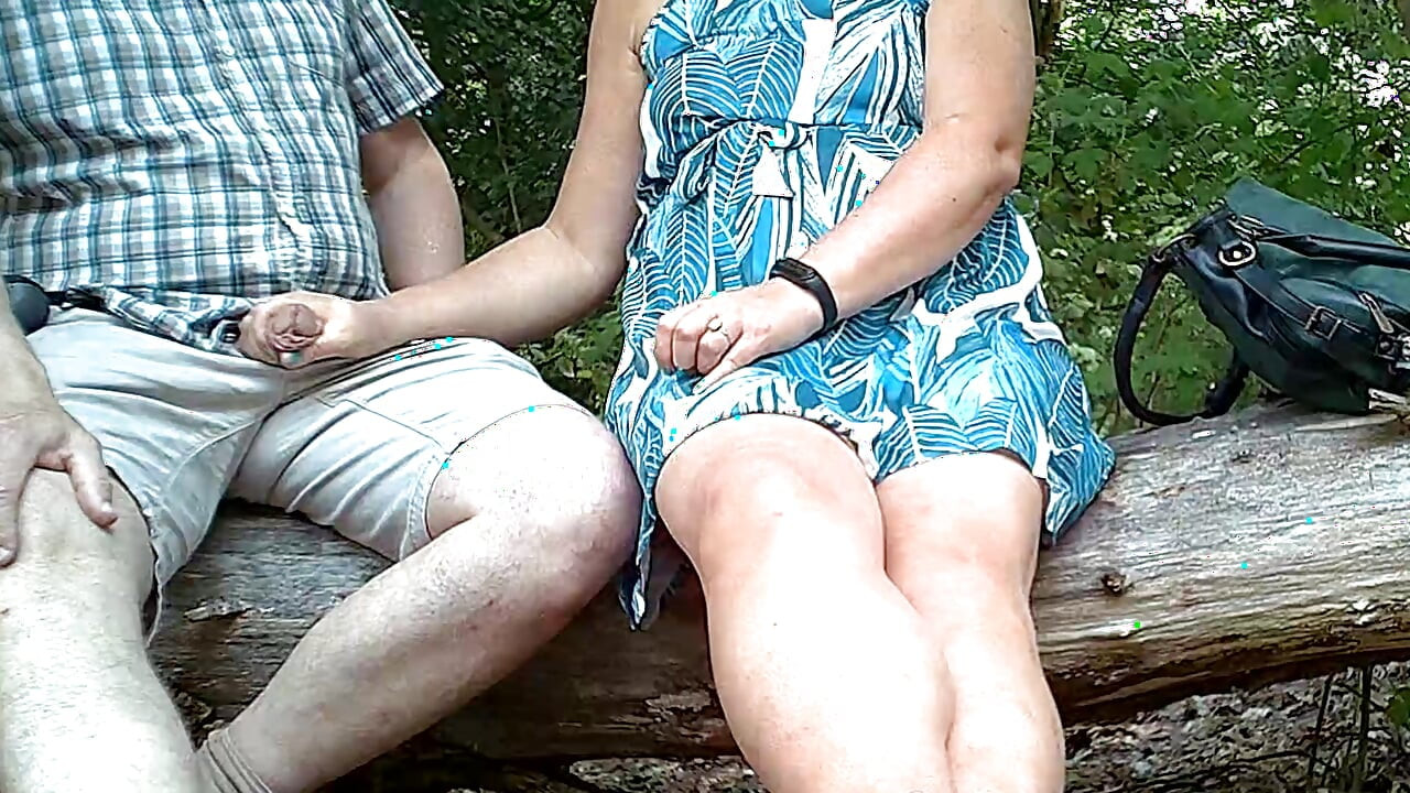 Handjob outdoors in the park in hot weather