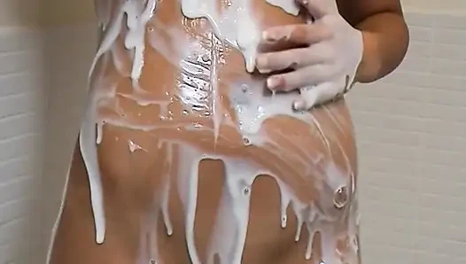 Sunburnt Brunette Teen Sasha Enjoys Rubbing Her Muff in the Shower