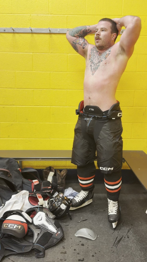 Naked hockey jock changing showering
