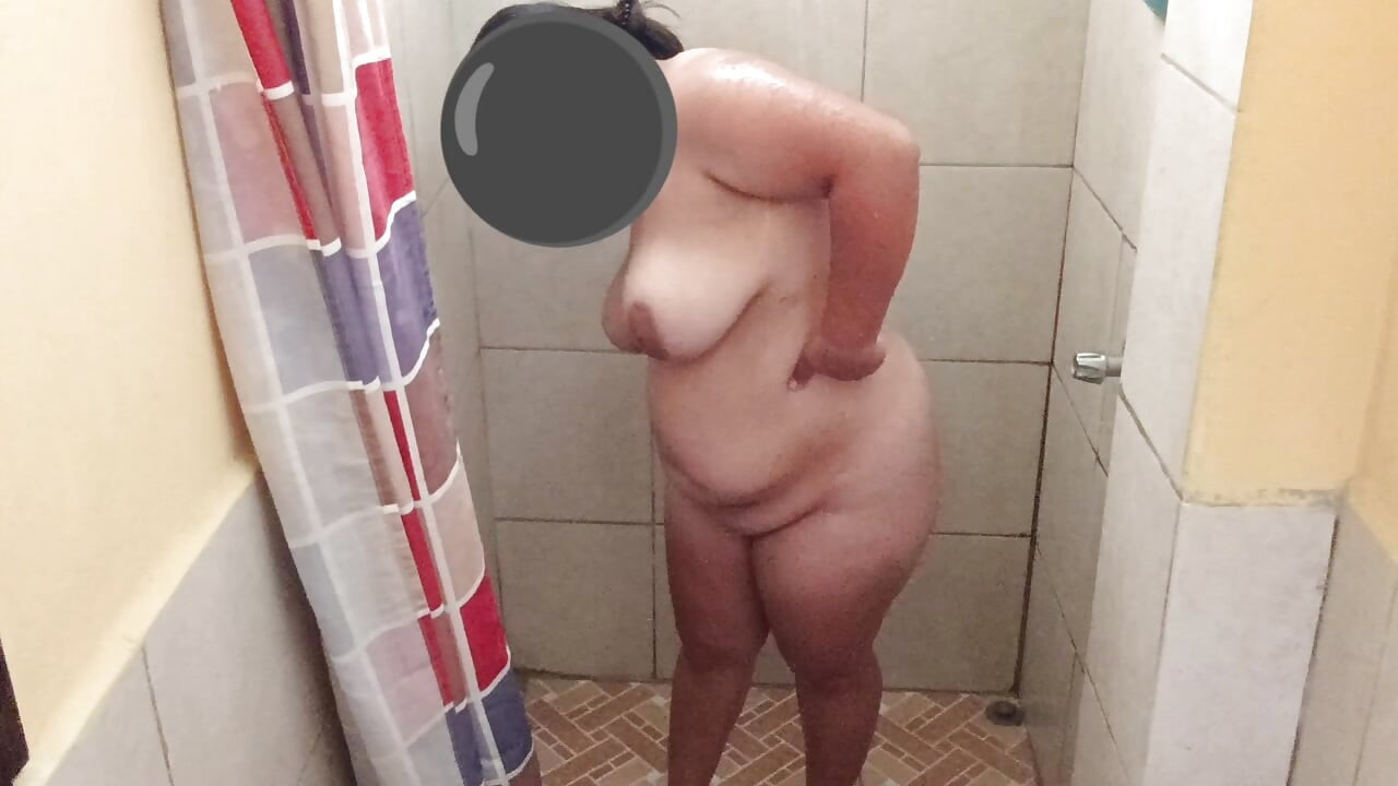 Taking a shower in a public restroom.