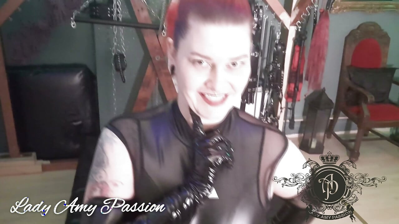 German dominatrix in wetlook and overknees high heels