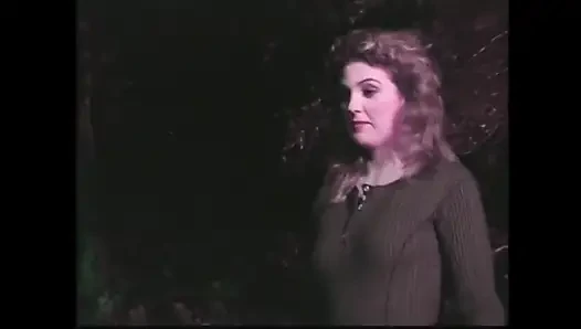 A Brunette and a Blonde with Huge Tits Have Sex in Front of the Campfire