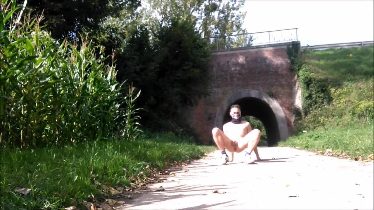 naked in front of bridge