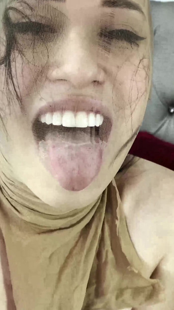 Memorable moment from "Two hot Latinas with a very special clothing fetish"