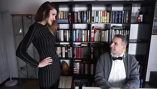 Femdom chick punishes her male slave in the office