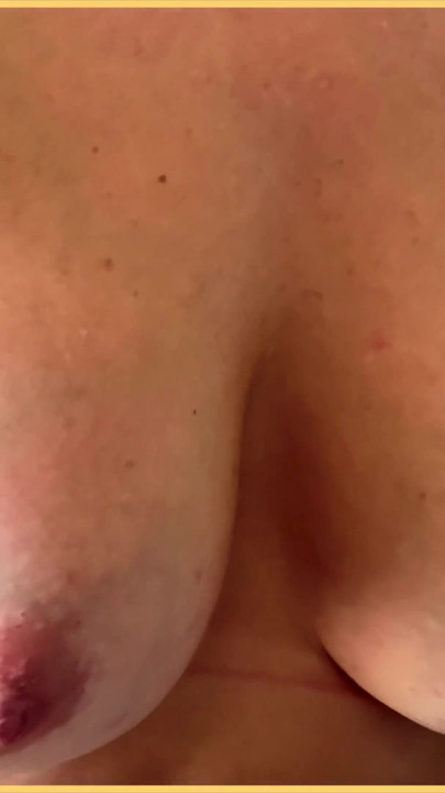 Key moment from "Wifeys big perfect tits getting vibrated and bounced in slow motion"