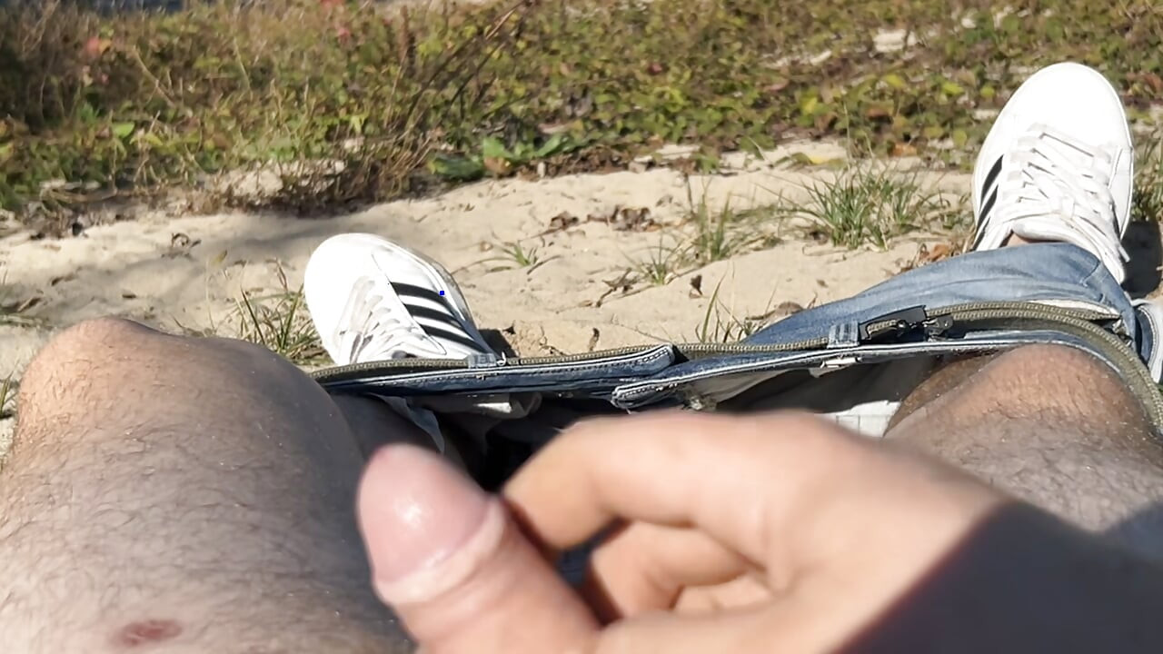 Flaccid penis next to the water