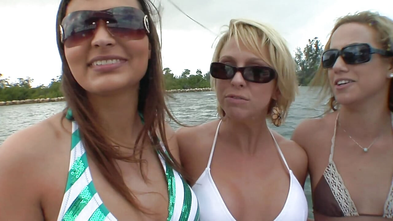Horny lesbians touching each other on the boat