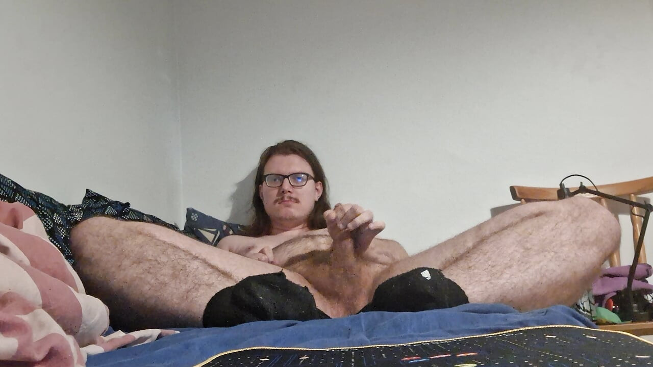 Young guy undresses, jerks off and shows feet